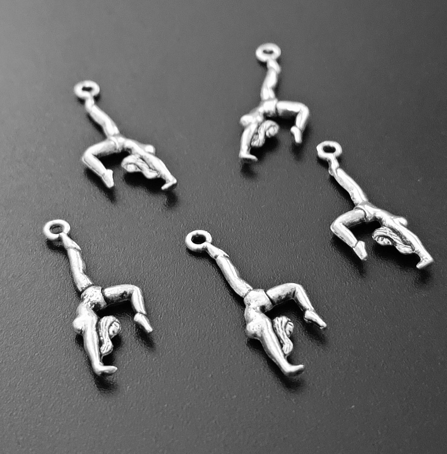 ESC-SA28: Antique Silver Gymnast Charm: 29x10mm