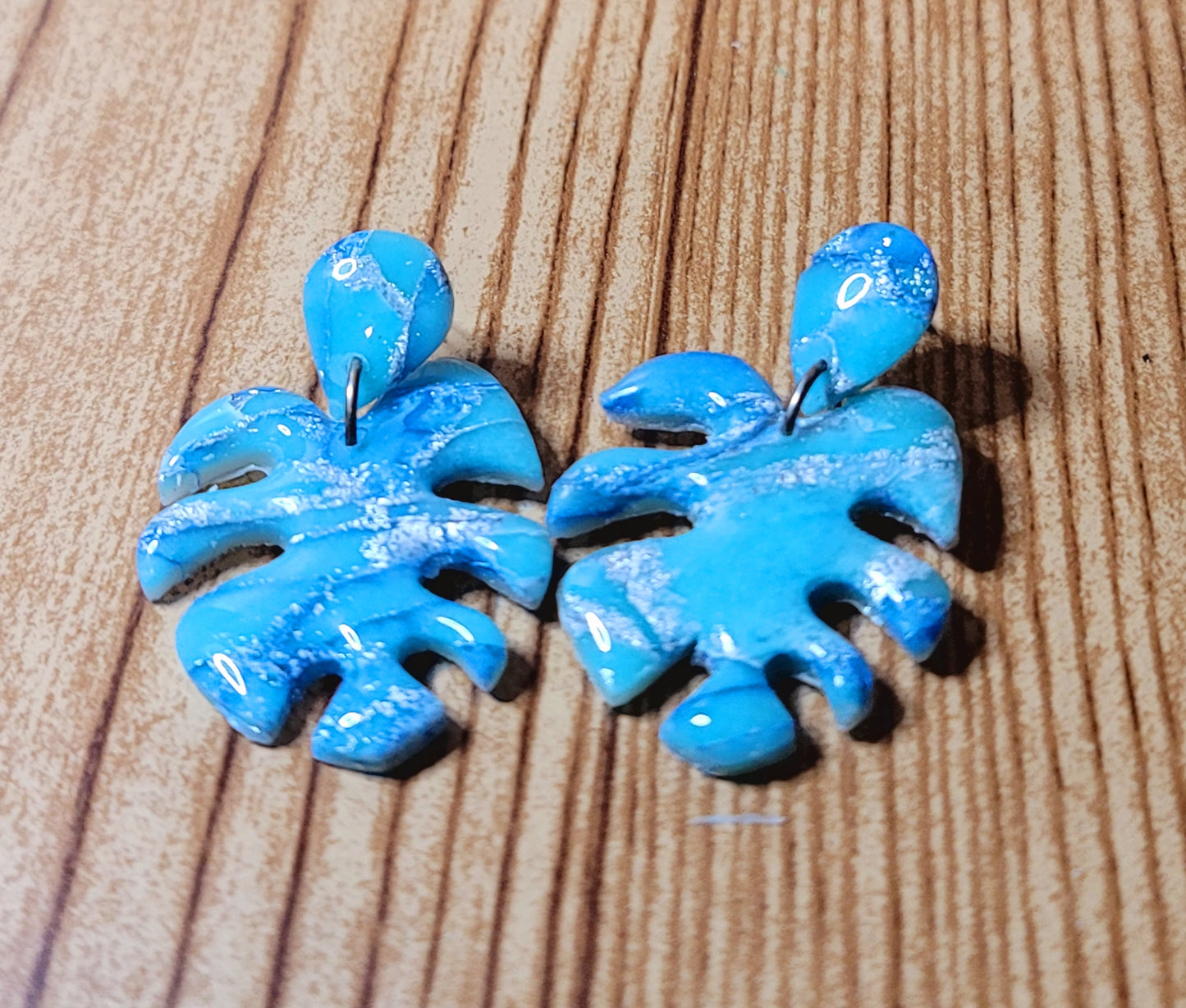 Soraya: Blue/White Polymer Clay Mostera Leaf Earrings with Silver Flakes