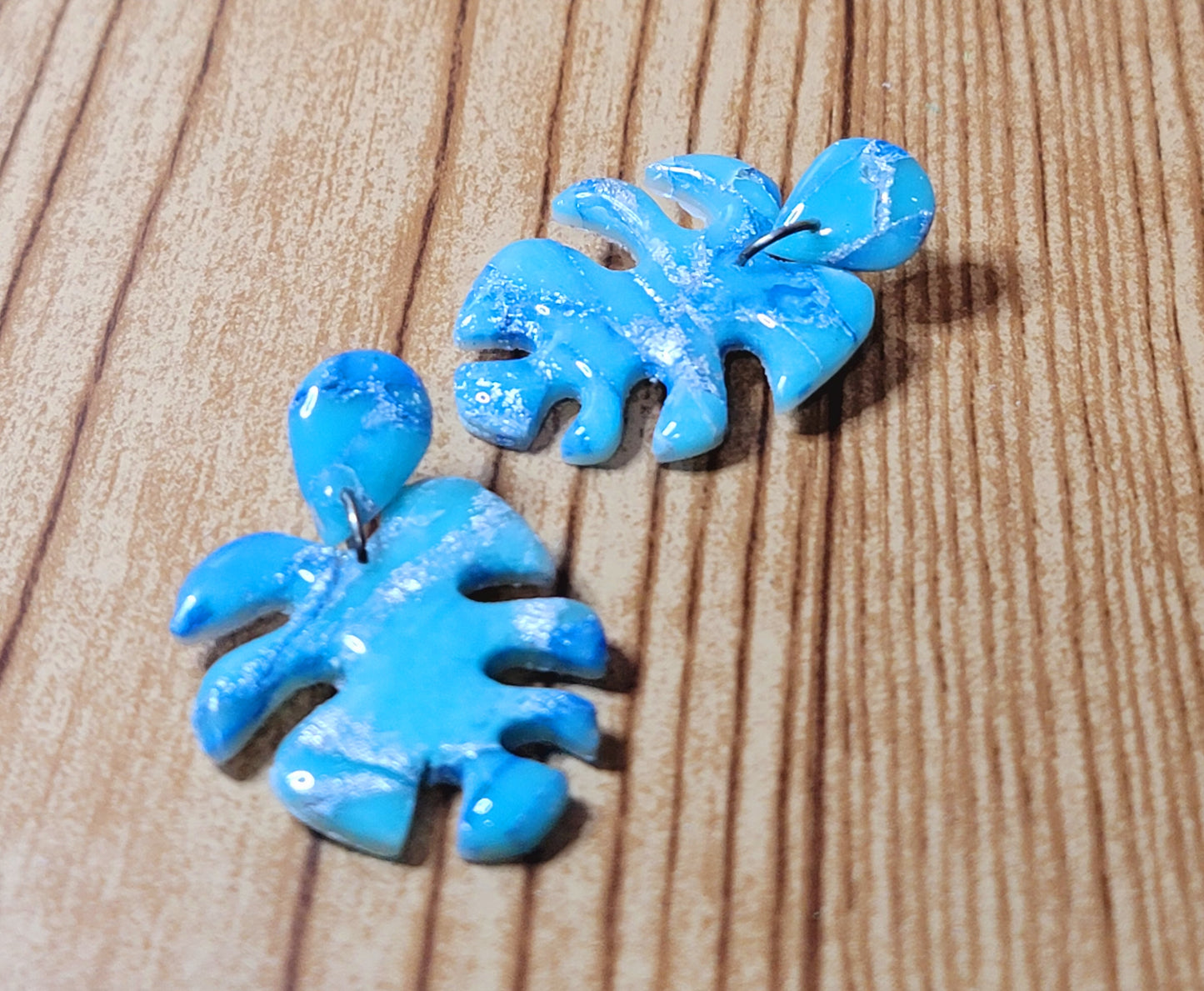 Soraya: Blue/White Polymer Clay Mostera Leaf Earrings with Silver Flakes