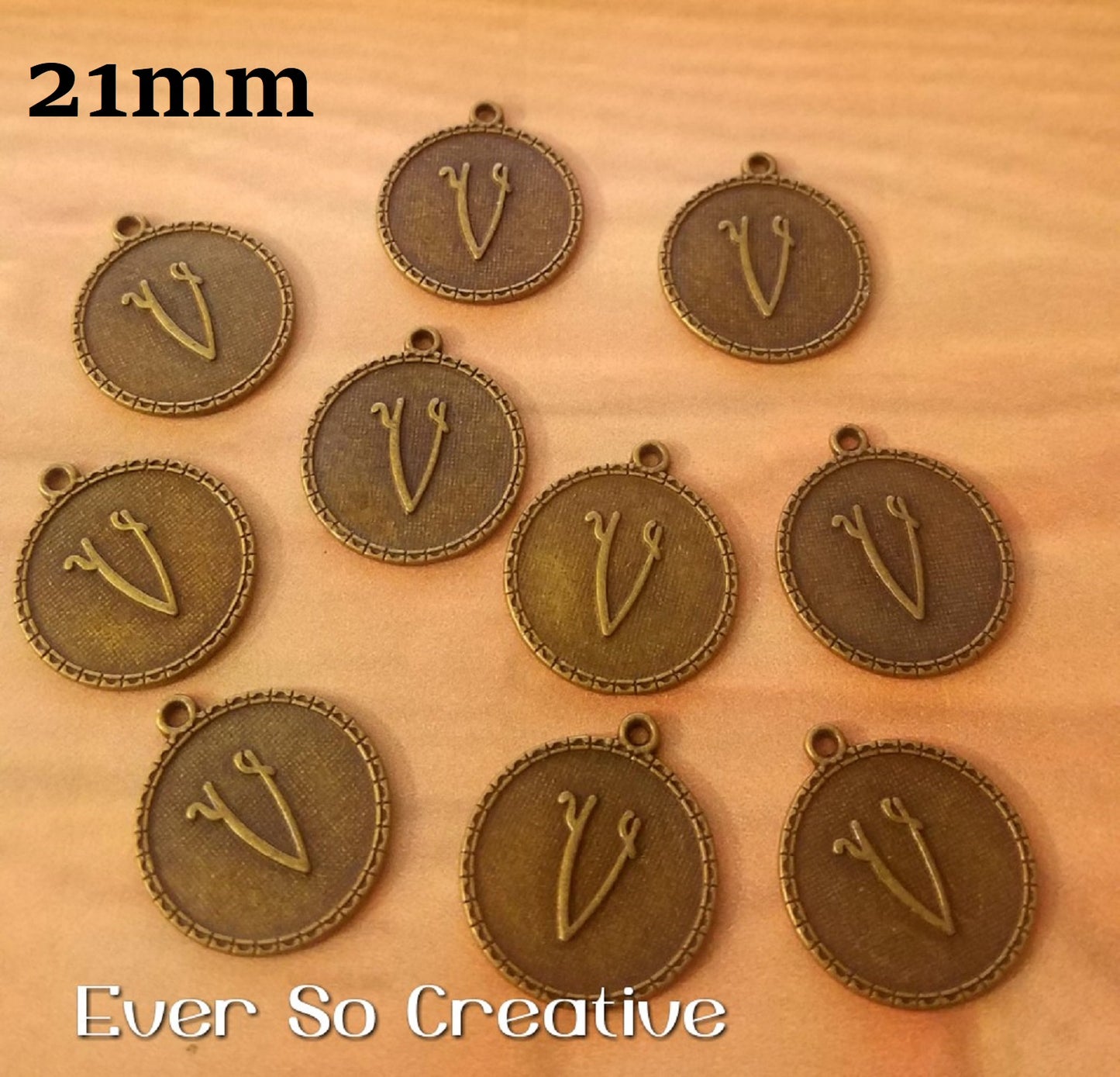 ESC-LW22: Antique Brass Letter "V" Coin Charms: 21x19mm