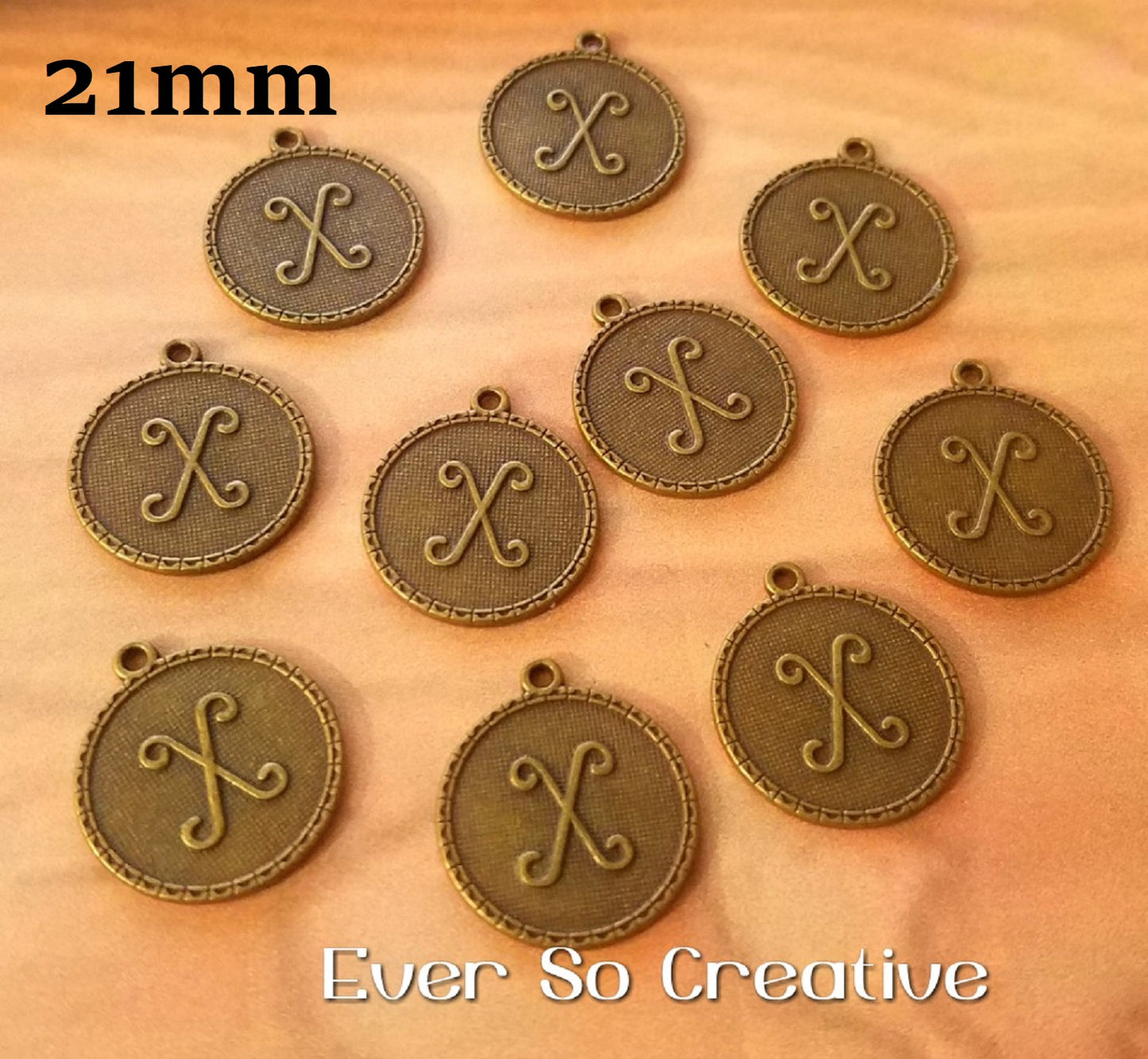 ESC-LW24: Antique Brass Letter "X" Coin Charms: 21x19mm