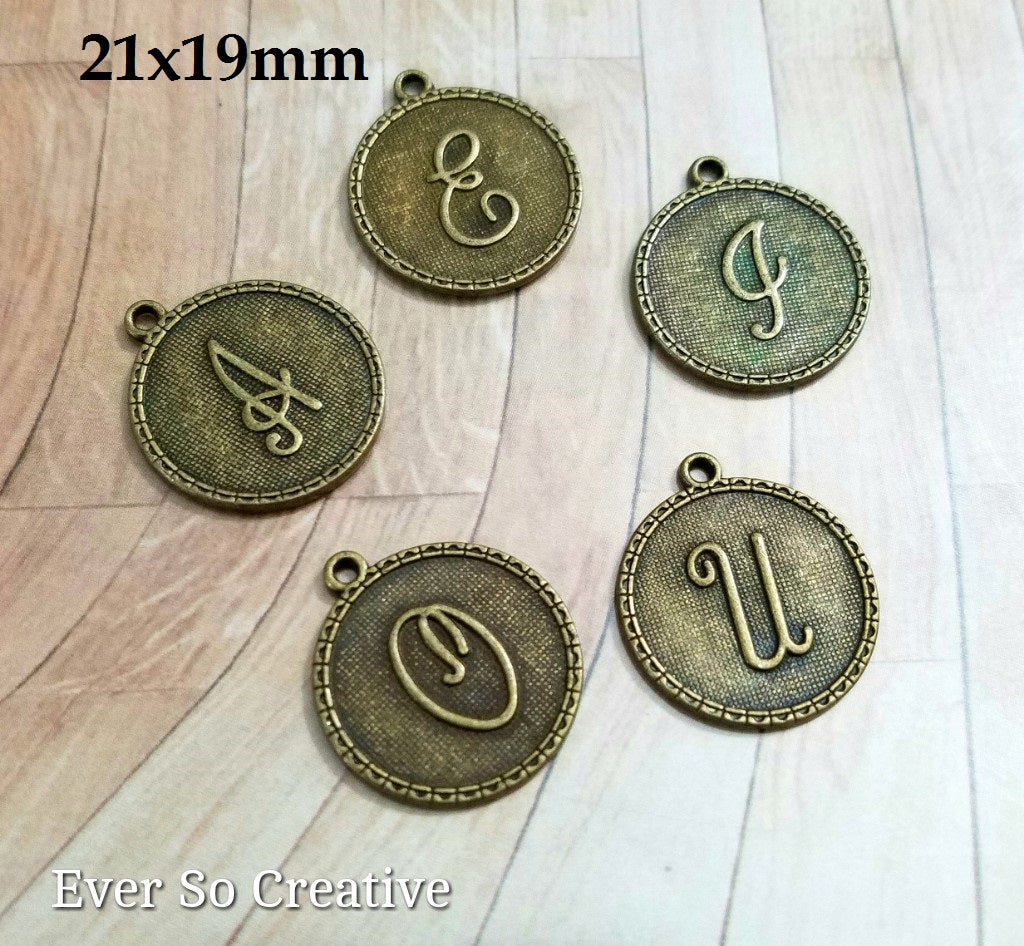 ESC-LW27: Antique Brass Vowel Letter Coin Charms: 21x19mm