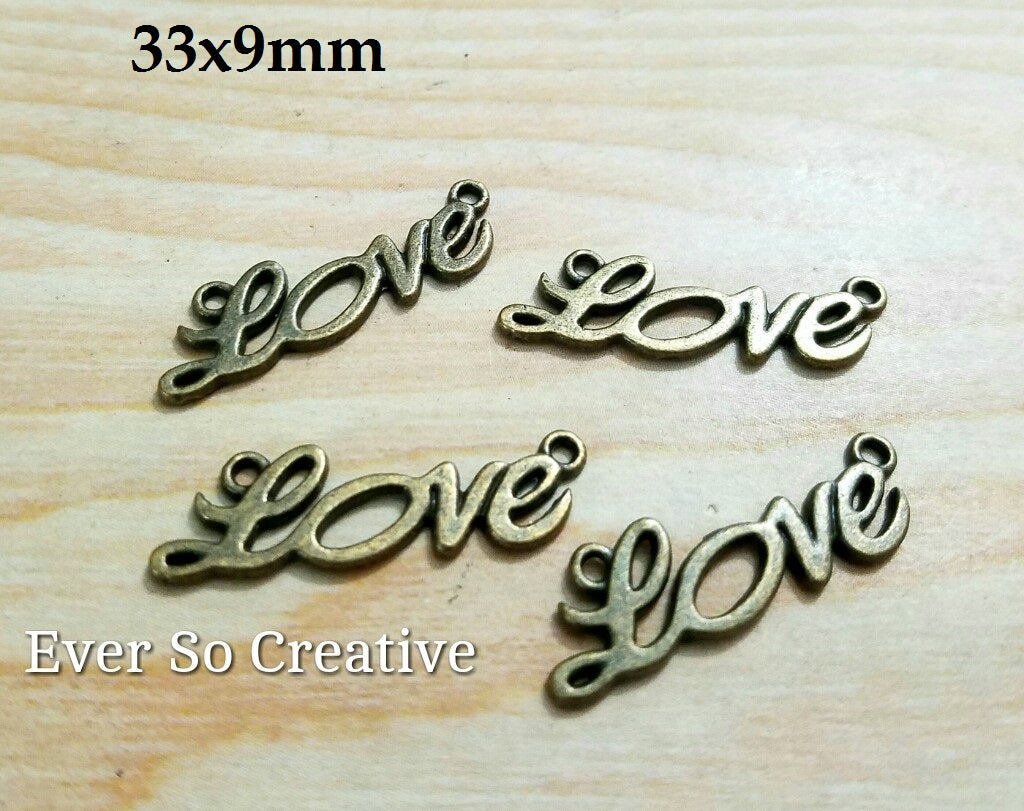 ESC-LW33: Antique Brass Love Pendants: 33x9mm